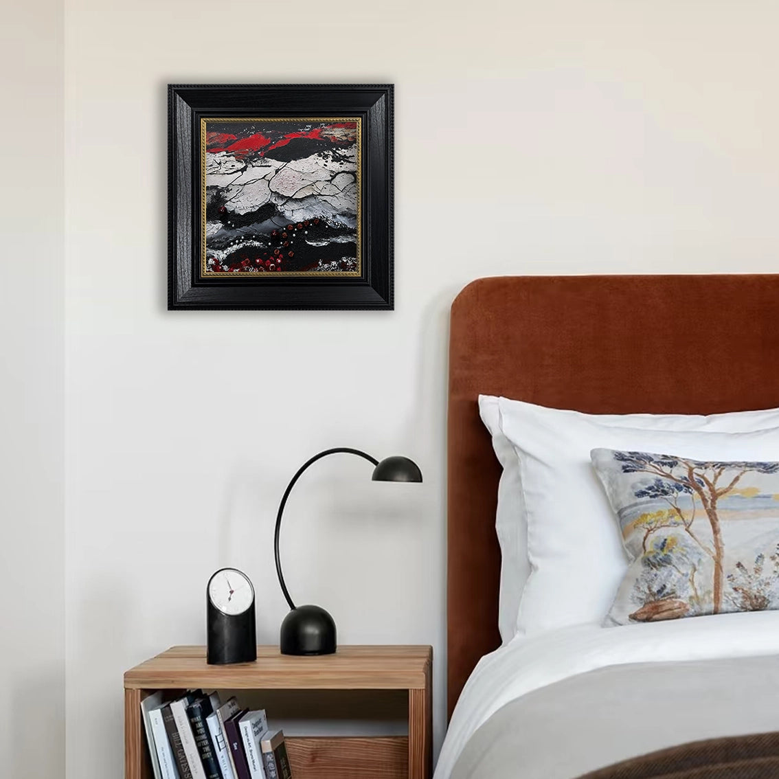 Textured wall art with pearl inlay, featuring black, red, and white tones. A sophisticated piece for contemporary wall décor.