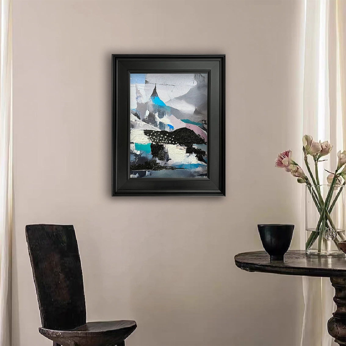 Abstract textured wall art with pearl inlay hanging in a minimalist dining corner for modern wall decor.