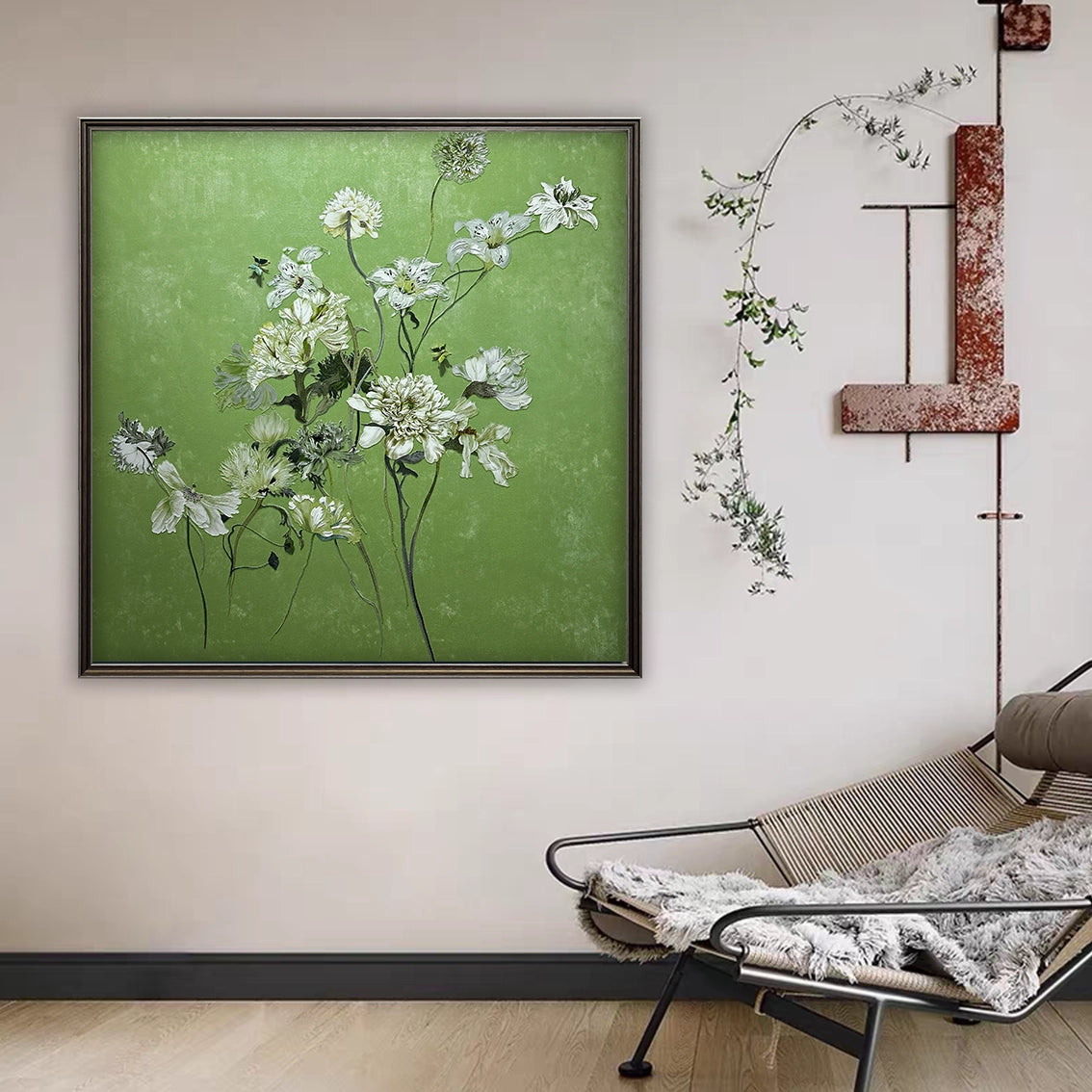 Green floral wall art with textured details and diamond inlay enhancing a cozy reading corner.