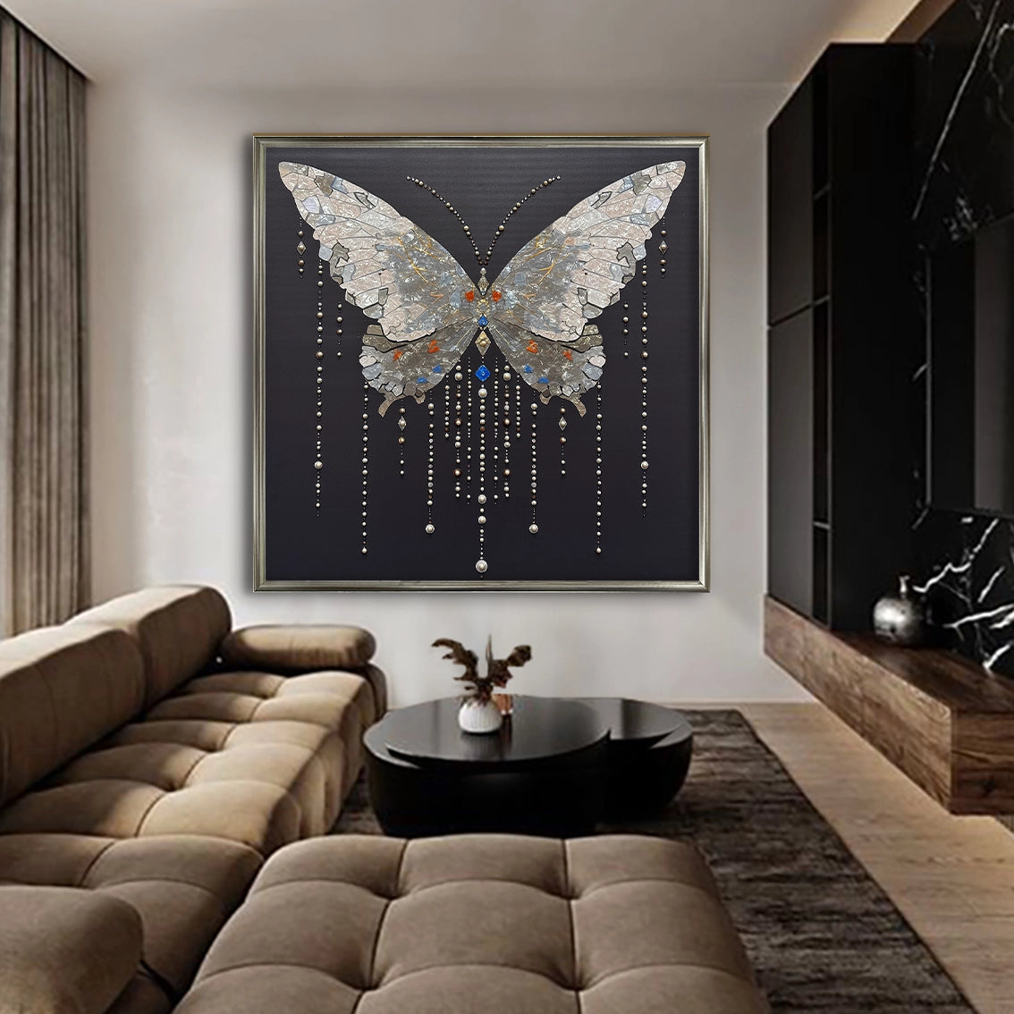 Modern butterfly wall decor with pearl and crystal detailing showcased above a large sofa.