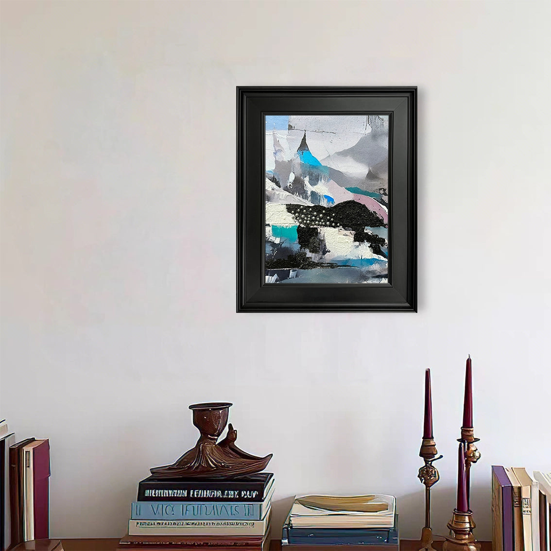 Modern textured abstract wall art with pearl inlay decorating a stylish workspace wall.