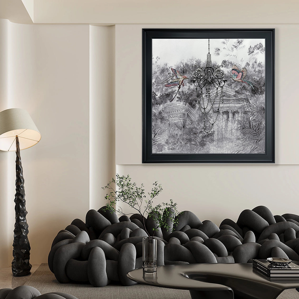 Elegant chandelier and bird textured wall art with pearl craftsmanship displayed in a modern living room.